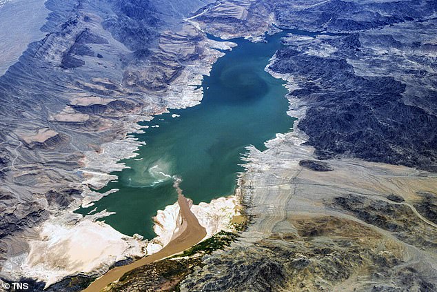 Seven states clash over Colorado River cuts as drought worsens.