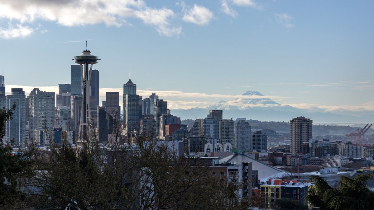 Seattle mayor faces backlash after supporting cameras that captured assault of elderly man.