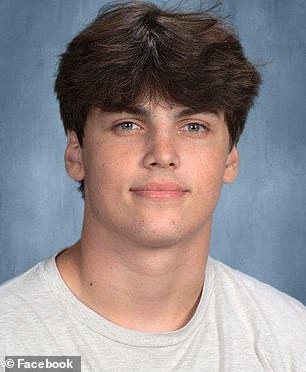 Hunter Metcalf accepts posthumous diploma for slain twin brother